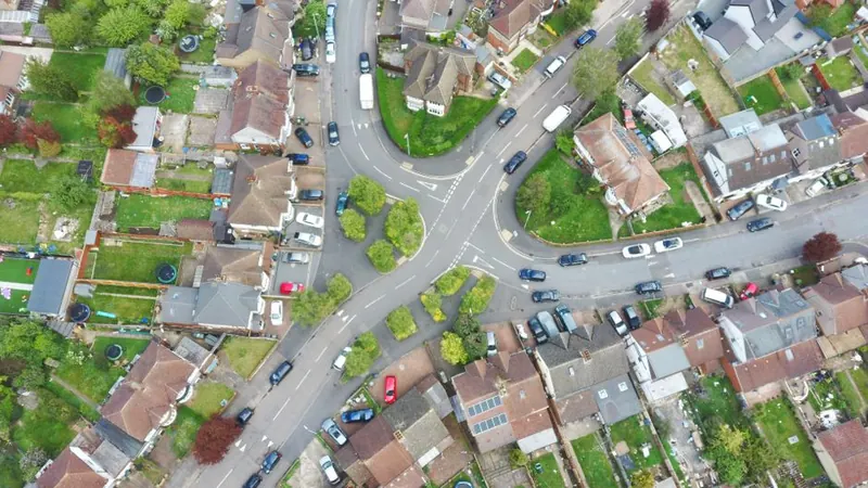 Aerial view over the rooftops and gardens of a west London estate