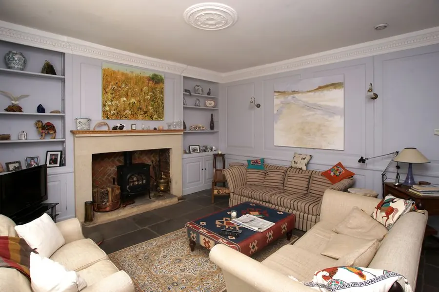 Chimney breast and alcoves in the front room of a west London period house