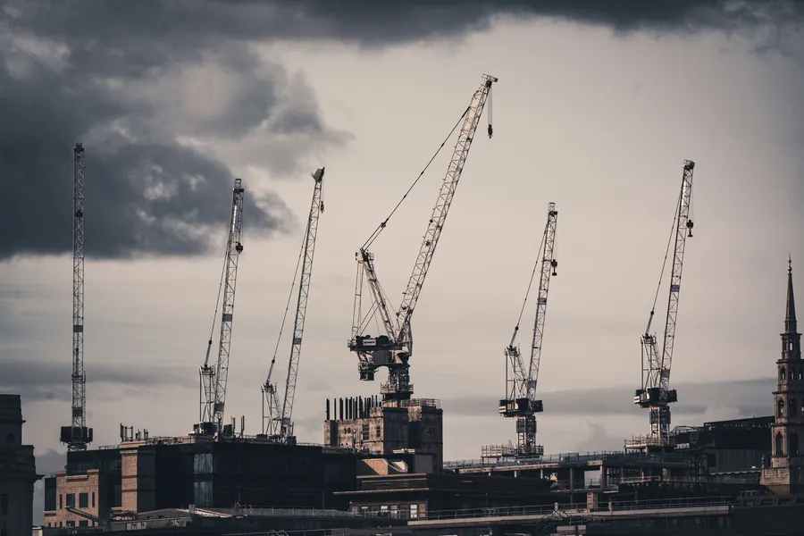 Construction cranes over the London skyline, the tall plant that triggers Heathrow height permits near Hounslow