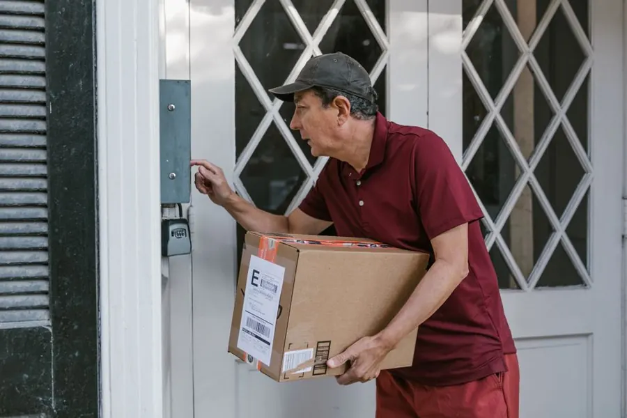 Unexpected caller standing at a front door