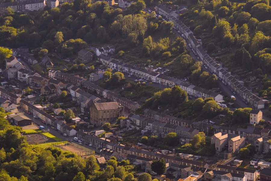 Rows of terraced houses with long ridge lines running along their roofs