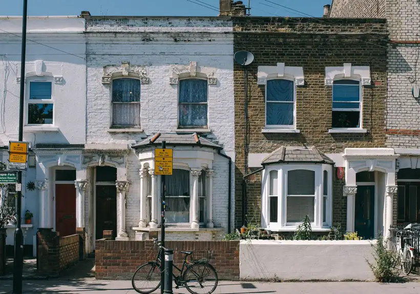 Victorian terrace where some houses have been painted and others left as original brick, the change Article 4 directions are meant to control