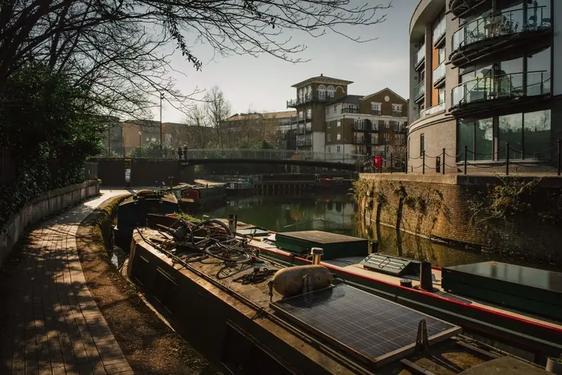 Modern apartment blocks rising above the canal waterfront at Brentford